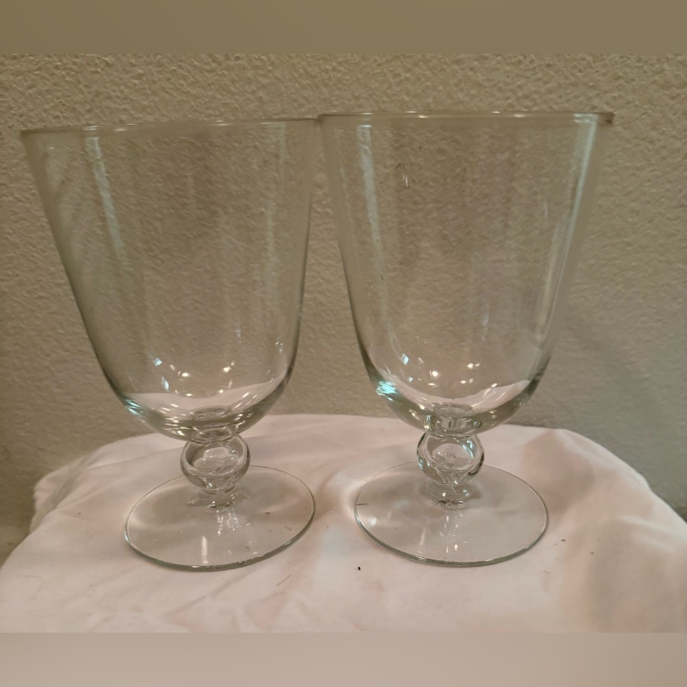 2 Kosta Boda glasses.